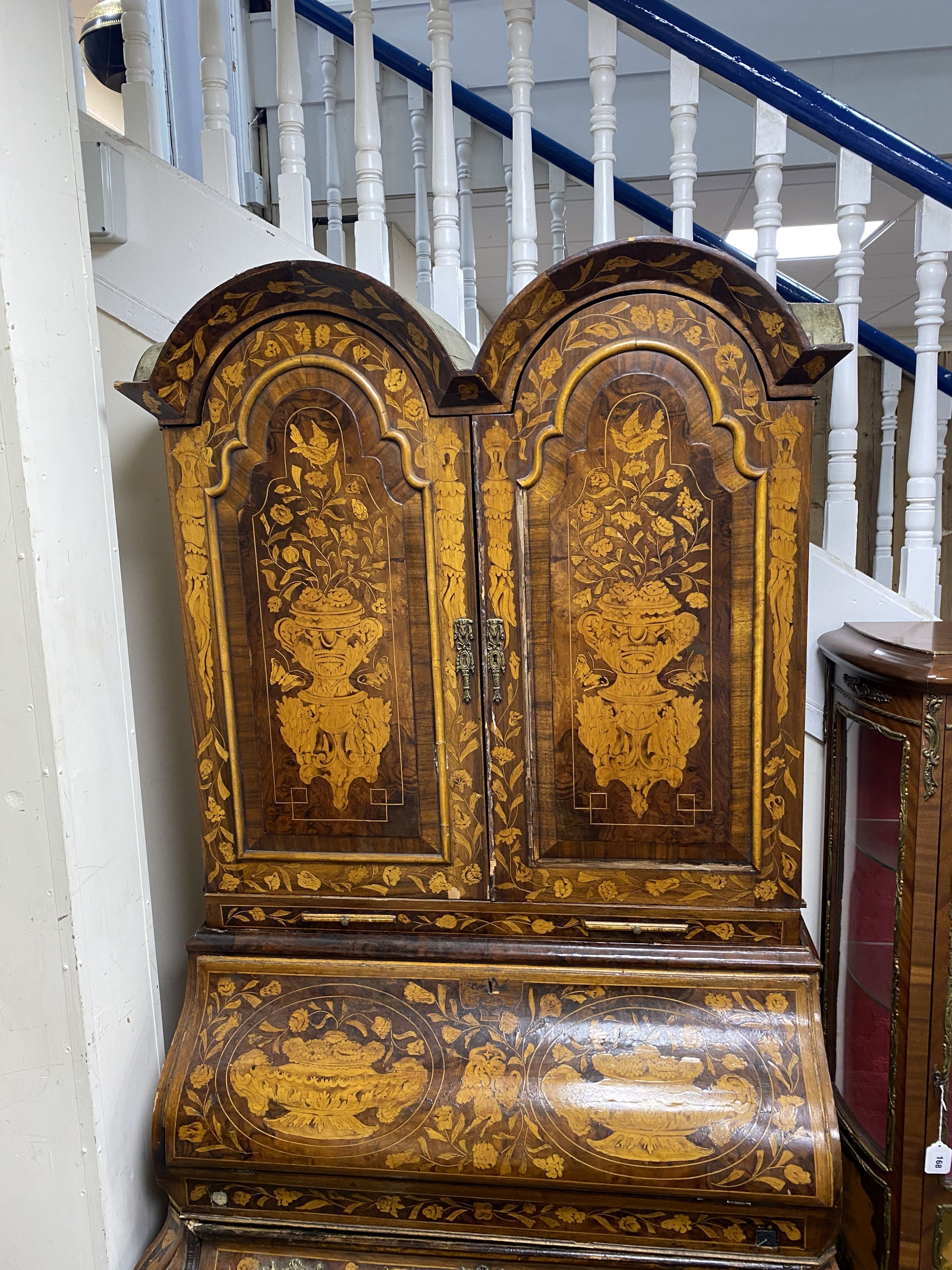 A Dutch floral marquetry walnut bombe bureau cabinet, width 120cm, depth 60cm, height 210cm